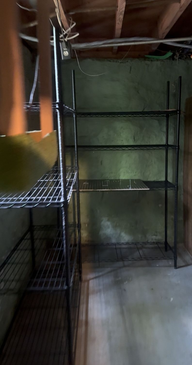 Same storage corner with shelves cleared